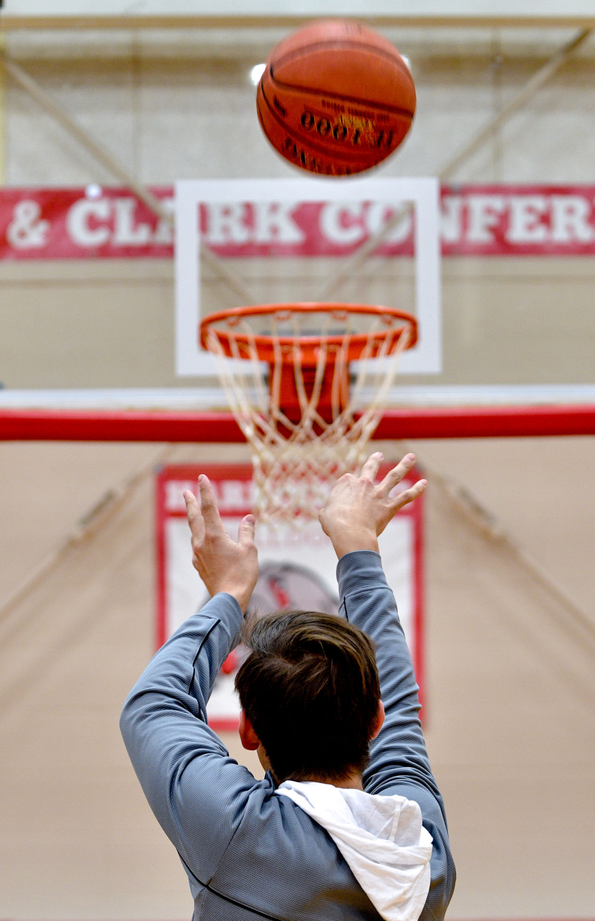 A Harrisburg Bulldog player practices free throws at Harrisburg